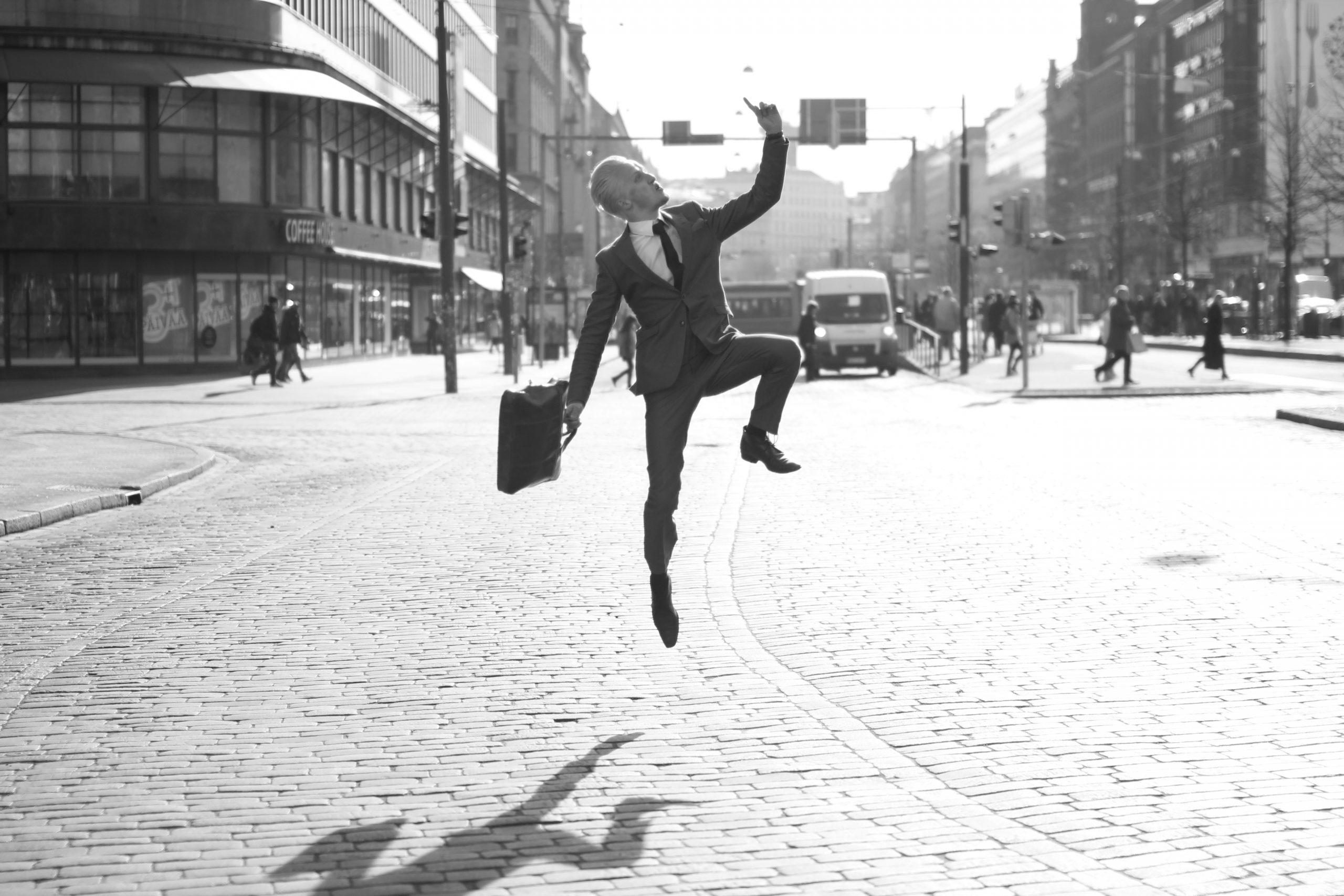 Anders Holm jumping in the street